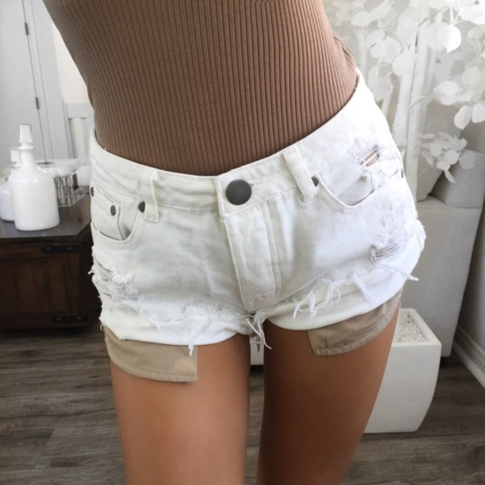 MALIBU Ivory Tan Distressed Denim Shorts